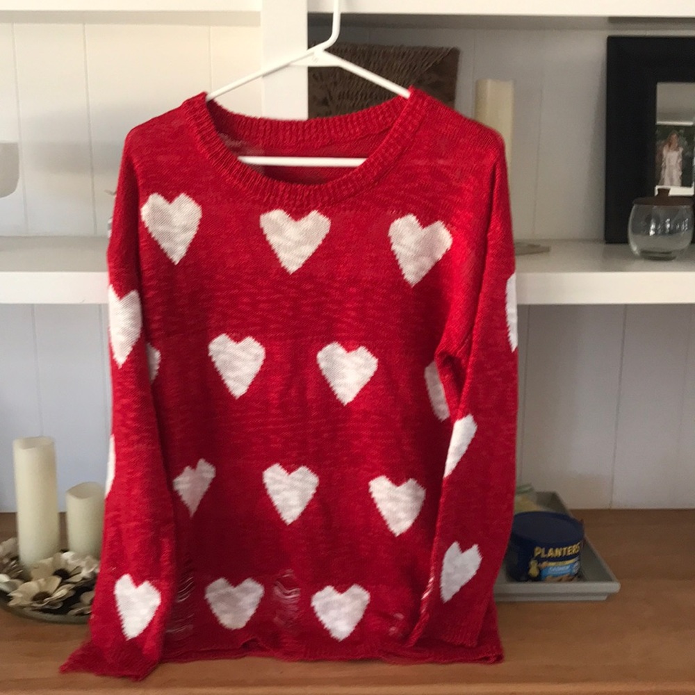 Red sweater. So cute